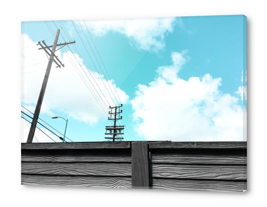 electric pole with wooden wall and blue cloudy sky in the city Acrylic prints by Timmy333