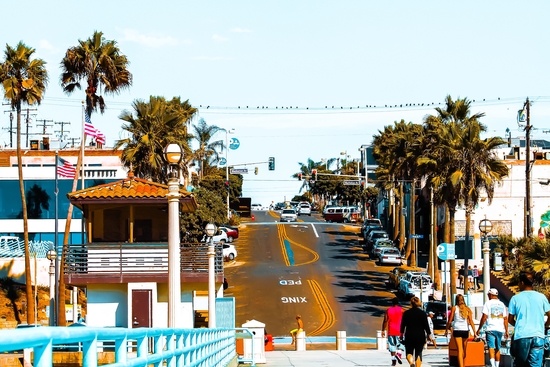 road to the pier with palm tree at Manhattan Beach, California, USA by Timmy333