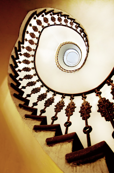 Spiral staircase in warm colours by Jarek Blaminsky