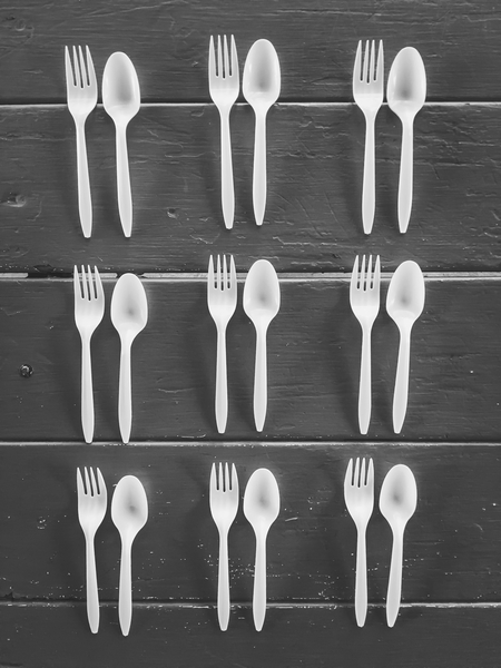 forks and spoons with wood background in black and white by Timmy333