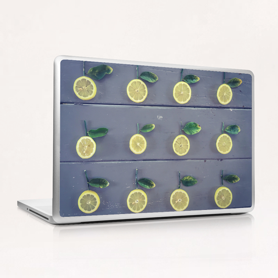 pieces of lemon on the wooden table Laptop & iPad Skin by Timmy333