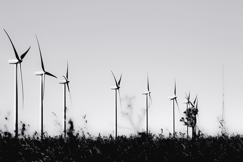 desert with wind turbine in black and white Mural by Timmy333