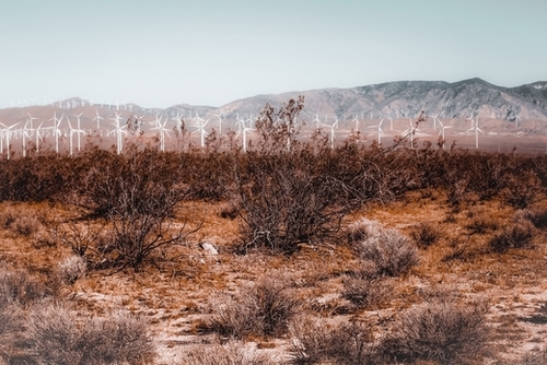 Desert and wind turbine with mountain view at Kern County California USA Mural by Timmy333