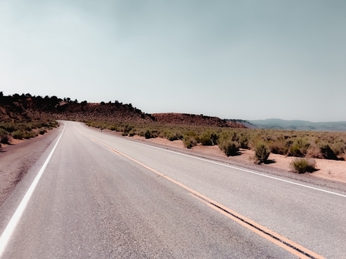 Road with the desert view and blue sky in California USA Mural by Timmy333