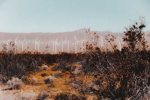 Desert and wind turbine with mountain background at Kern County California USA Mural by Timmy333