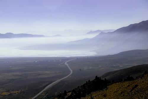 road with foggy sky and mountains scenic in California Mural by Timmy333