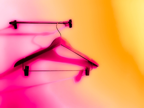 wood hanger with pink and orange wall background Mural by Timmy333