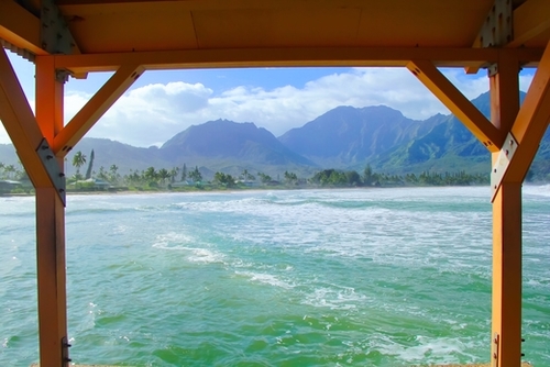 ocean view with mountain and blue cloudy sky background at Kauai, Hawaii, USA Mural by Timmy333