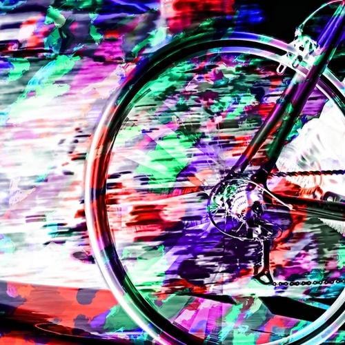 bicycle wheel with colorful abstract background in green red and purple Mural by Timmy333
