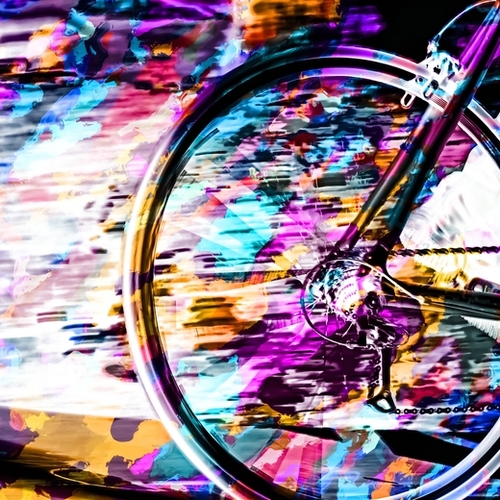 bicycle wheel with colorful abstract background in pink blue orange Mural by Timmy333