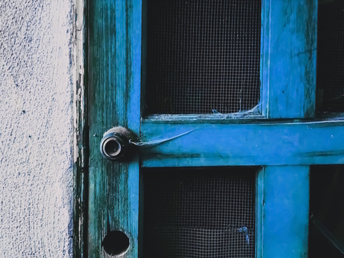 closeup old blue vintage wood door texture background Mural by Timmy333